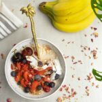 yellow banana fruit beside stainless steel fork