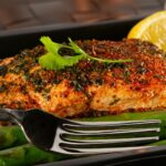 a close up of a plate of food with a fork