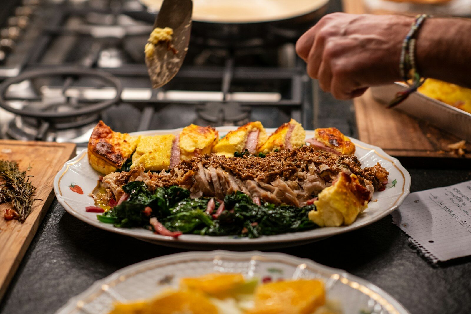a plate of food is being prepared on a table