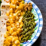 yellow corn on white and blue ceramic plate