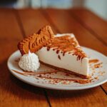 a piece of cheesecake on a white plate