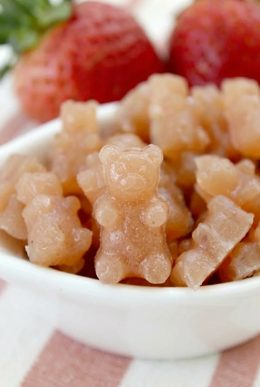 Close view of miniature fruit snack bears showing their molded outlines and lightly glossy surfaces